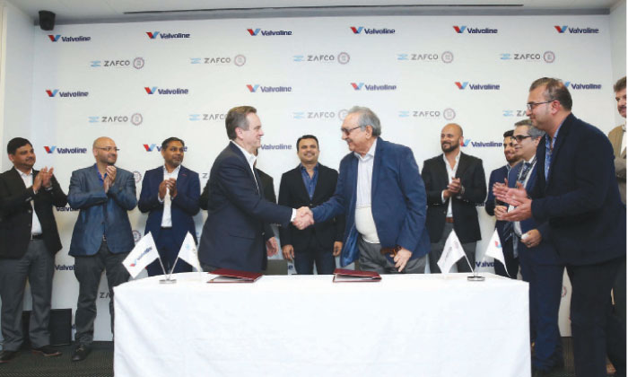 Craig Moughler and Azim Yusufzai at the partnership signing ceremony