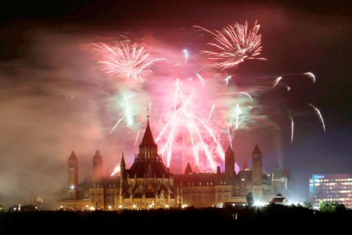 Fireworks explode over Ottawa’s Parliament Hill as part of Canada Day celebrations as the country marks its 150th anniversary since confederation, in Gatineau, Quebec, Canada, on Saturday. — Reuters